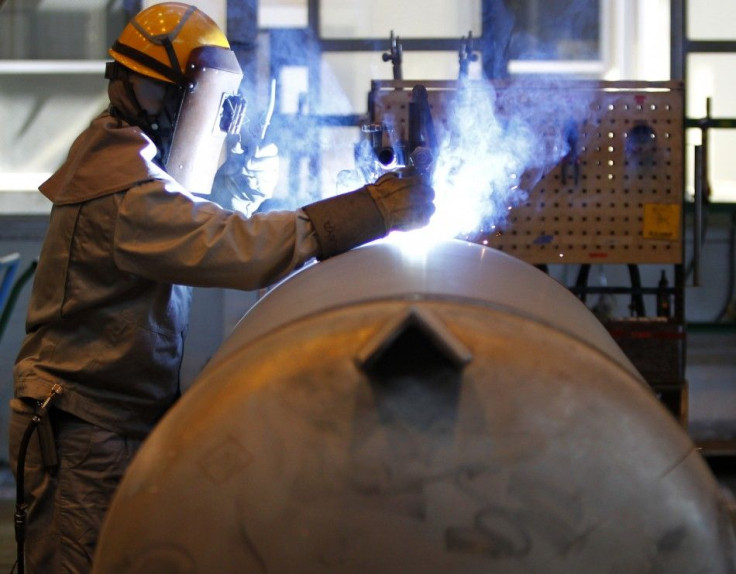 A worker welds Toshiba Corp's Shielded Ion Exchange Module for a radioactive water treatment facility at the Keihin Product Operations in Yokohama