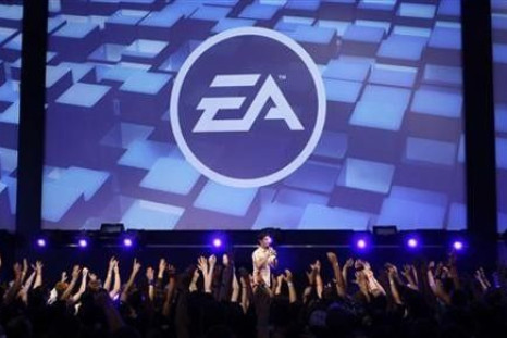 Visitors attend a show by Electronic Arts (EA) at the Gamescom 2009 fair in Cologne