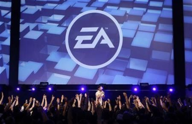 Visitors attend a show by Electronic Arts (EA) at the Gamescom 2009 fair in Cologne