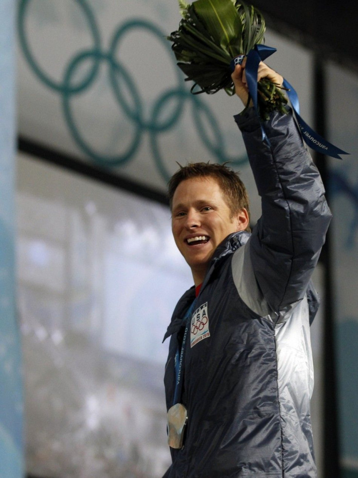 Silver medallist Peterson of U.S. poses during medals ceremony for men&#039;s aerials freestyle skiing event at Vancouver 2010 Winter Olympics