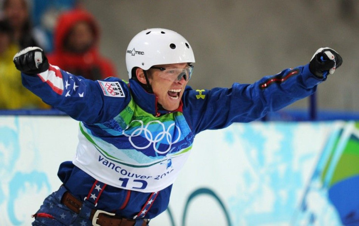 Jeret Peterson of the United States celebrates in the finish area after his second jump in the men&#039;s aerials freestyle skiing final on Cypress Mountain at the Vancouver 2010 Winter Olympics, February 25, 2010