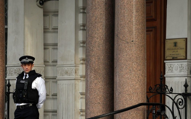 A police officer stands in front of the Libyan Embassy in London