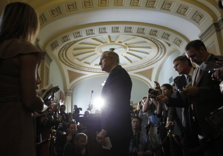 U.S. Senate Majority Leader Reid speaks to the press during debt reduction talks on Capitol Hill in Washington