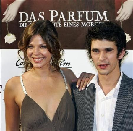 German actress Jessica Schwarz (L) poses with British actor Ben Whishaw before the premiere of the film ''The Perfume'' in Munich September 7, 2006.