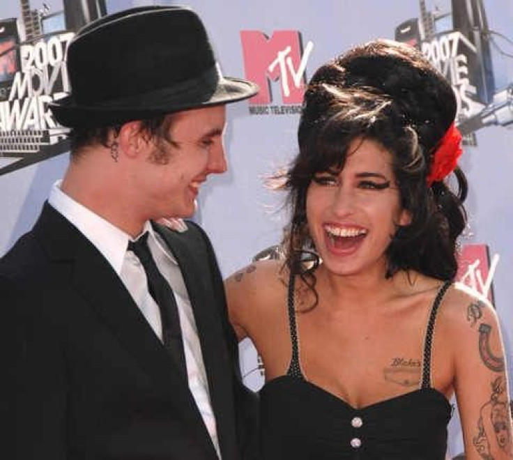 Singer Amy Winehouse and husband Blake Fielder-Civil attend the 2007 MTV Movie Awards in Los Angeles, California June 3, 2007.