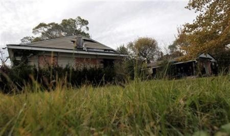 An abandoned and dilapidated home, one of 32 abandoned properties in the neighborhood listed on the auction block during the Wayne County tax foreclosures auction of almost 9,000 properties is seen in Detroit, Michigan, October 21, 2009.