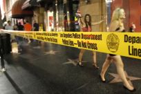 A police tape is pictured after a public disturbance in Hollywood, California July 27, 2011. Police dispersed an unruly crowd of several hundred people in Hollywood on Wednesday night after uninvited fans were turned away from the premiere of the &quot;El