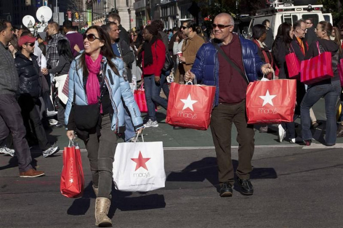Black Friday shoppers cross 34th Street outside Macy's in Herald Square in New York