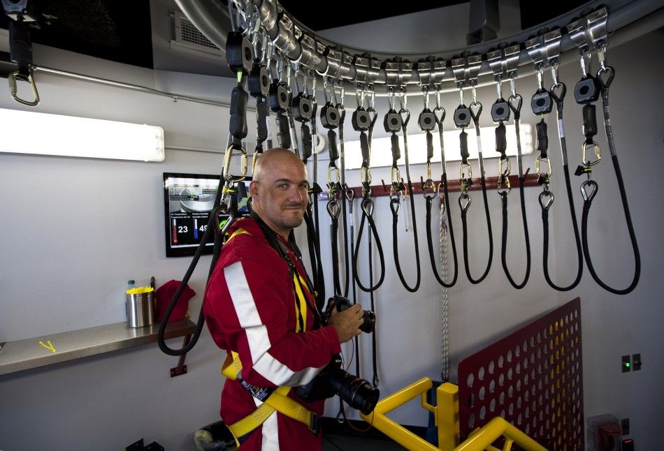 Photographer Mark Blinch is seen before the media preview for the quotEdgewalkquot on top of the CN Tower in Toronto