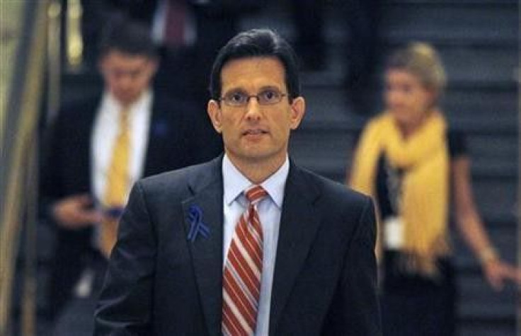 Rep. Eric Cantor (R-VA) walks to a meeting of the Republican caucus on U.S. debt reduction talks on Capitol Hill in Washington