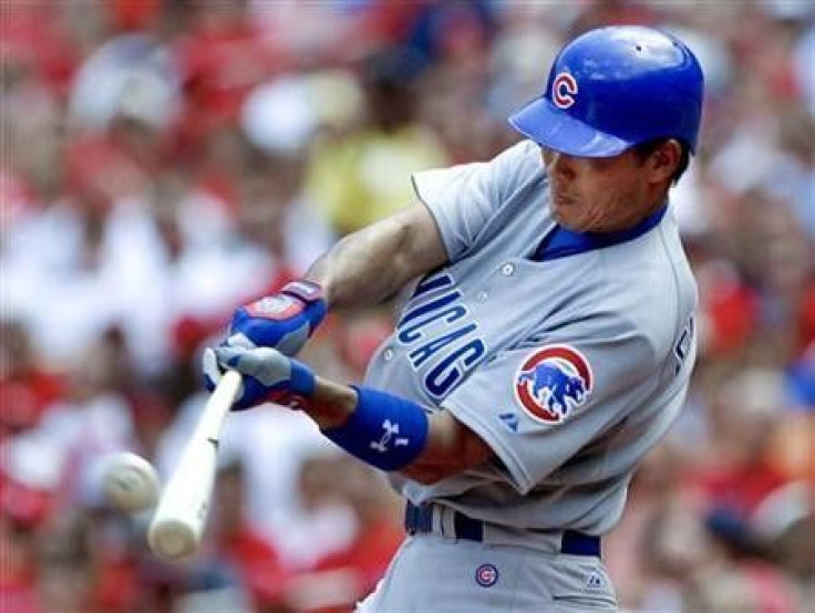 Chicago Cubs batter Kosuke Fukudome hits a RBI double in the fourth inning of their MLB National League baseball game against the St. Louis Cardinals in St. Louis, Missouri