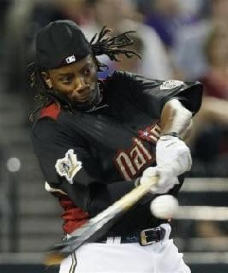 Rickie Weeks of the Milwaukee Brewers hits during the first round of the baseball All-Star Game Home Run Derby in Phoenix, Arizona, July 11, 2011.