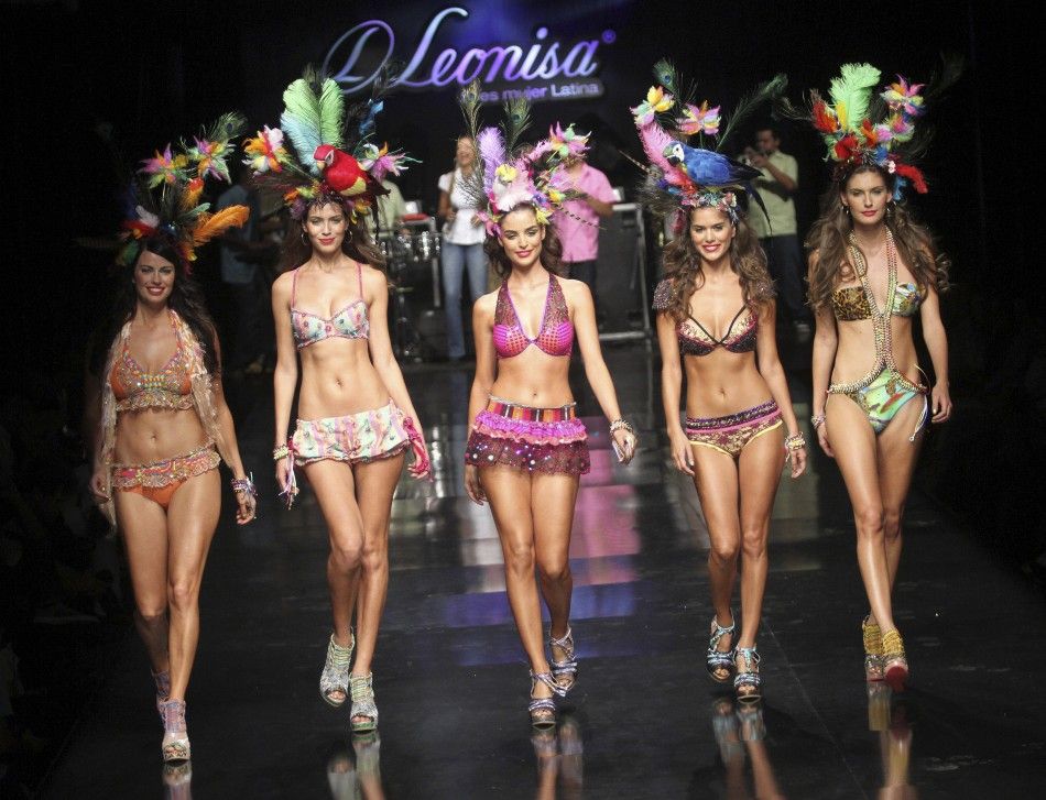 Models present creations by Colombian brand Leonisa during the Colombiamoda fashion show in Medellin 