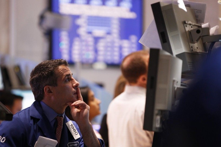 A trader works on the floor of the New York Stock Exchange in New York
