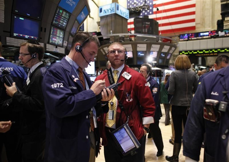 Traders work on the floor of the New York Stock Exchange