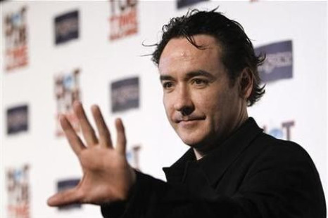 John Cusack waves at the premiere of &#039;&#039;Hot Tub Time Machine&#039;&#039; in Hollywood, California