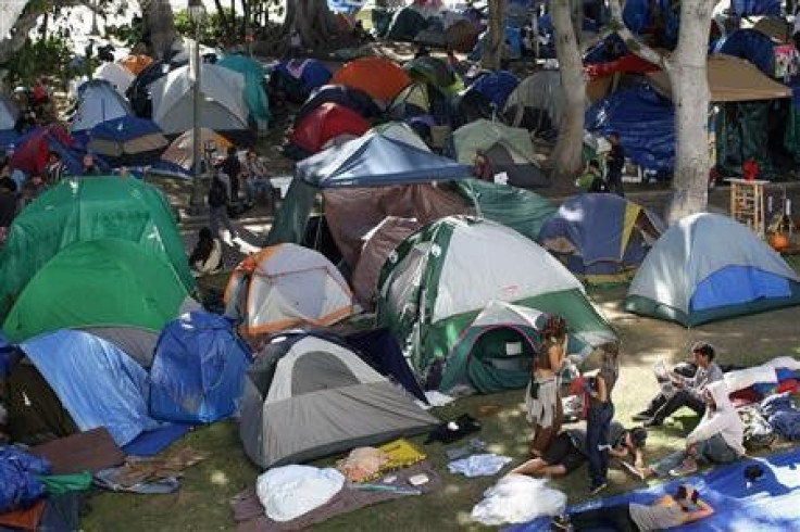 Occupiers continue to camp prior to an anticipated police raid to shut down the Occupy Los Angeles encampment outside City Hall in Los Angeles, California November 26, 2011.