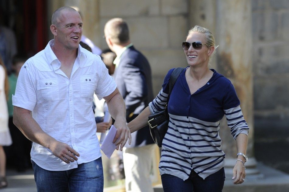 Britains Zara Phillips, the eldest granddaughter of Queen Elizabeth, and England rugby captain Mike Tindall leave Canongate Kirk, following their wedding rehearsal, in Edinburgh, Scotland 