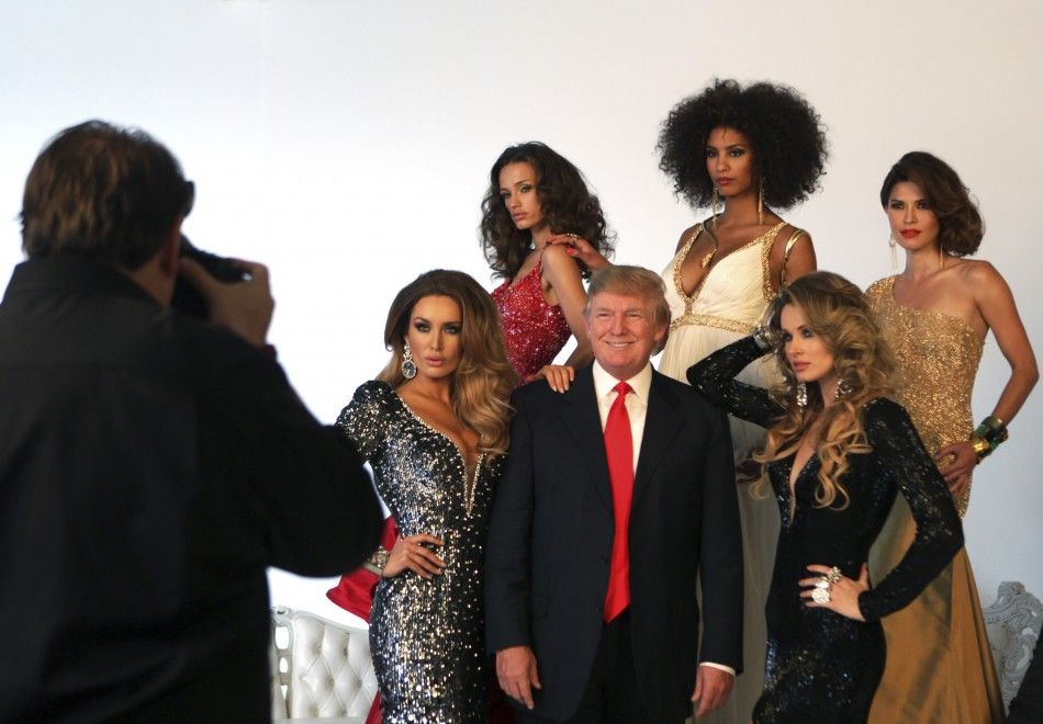 Trump poses with former Miss Universe Beauty Queens during a pageant photoshoot in New York