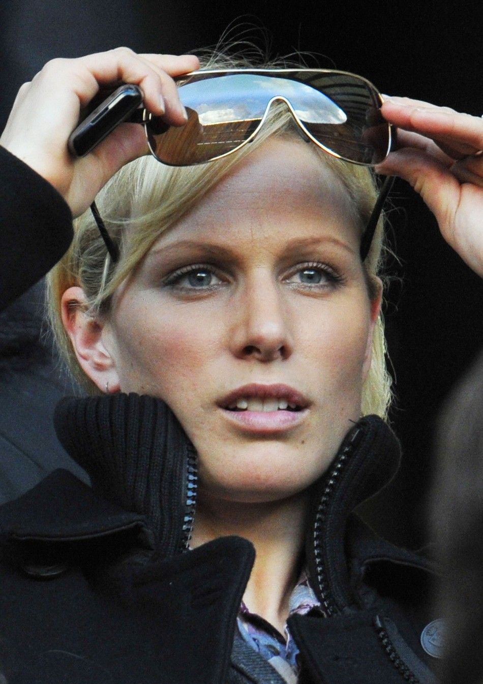 Britains Zara Phillips watches England play Italy in their Six Nations rugby union match at Twickenham in west London