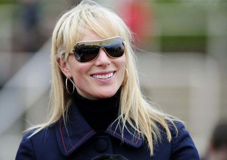 Britains Zara Phillips smiles during the second day of the Cheltenham Festival horse racing meeting in Gloucestershire
