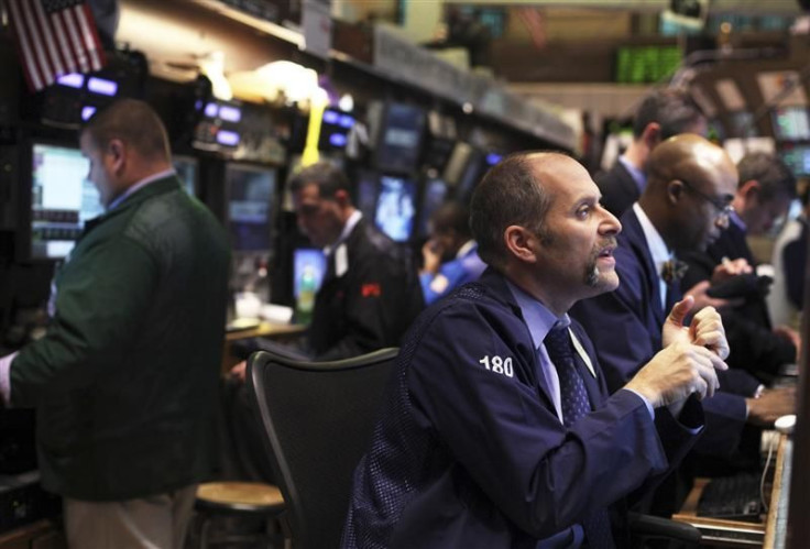 Traders work on the floor of the New York Stock Exchange