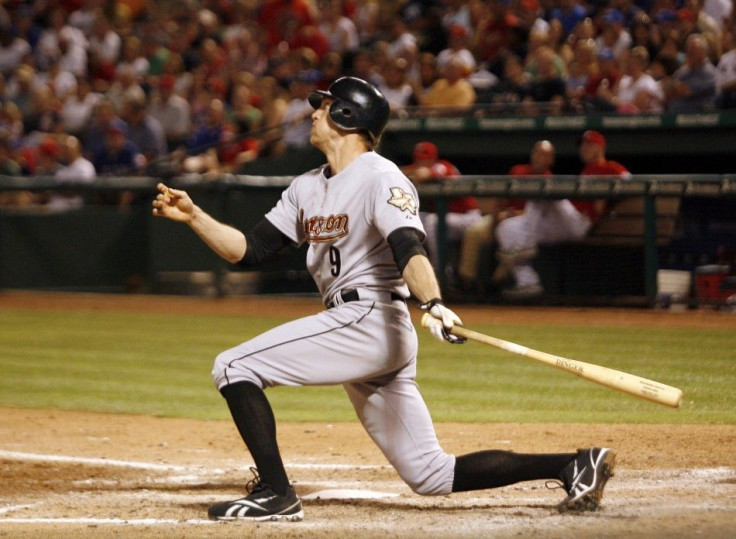 Houston Astros right Hunter Pence hits a home run against the Texas Rangers in Arlington, Texas