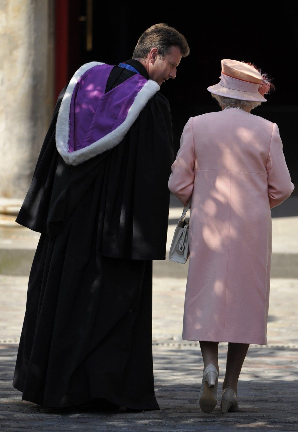 Britains Queen Elizabeth talks to the Reverend Neil Gardner 