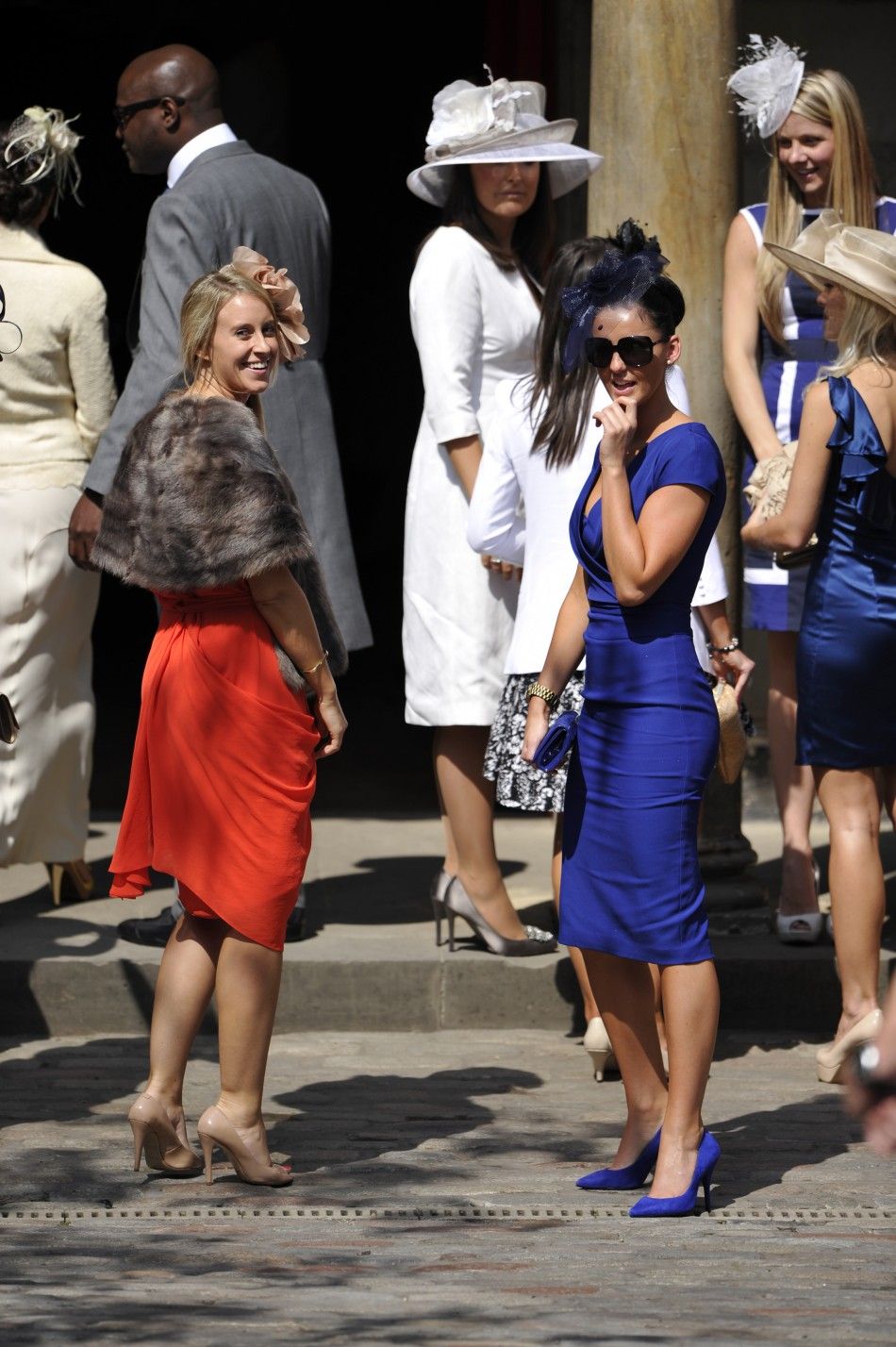 Unidentified guests arrive before the marriage of Britains Zara Phillips