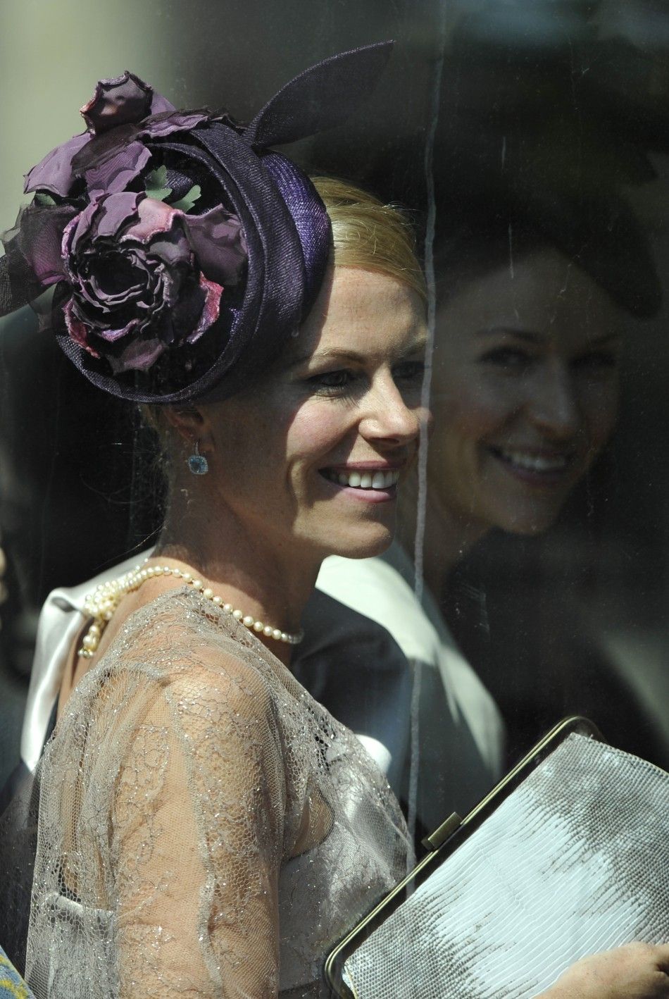 A guest arrives before the marriage of Britains Zara Phillips