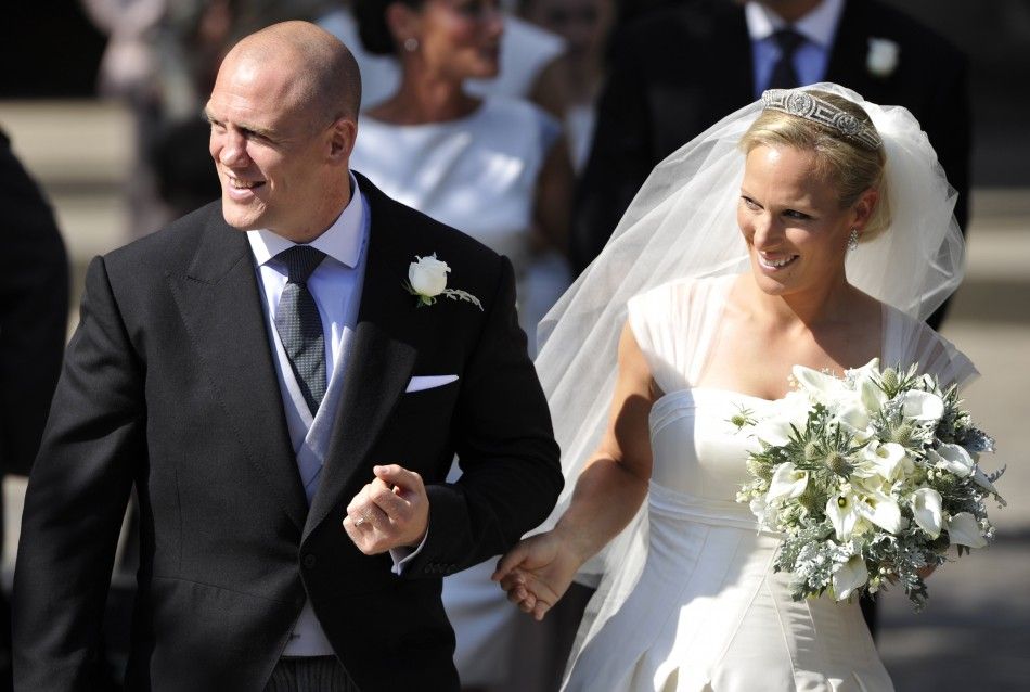  Britains Zara Phillips and her husband England rugby captain Mike Tindall leave the church after their marriage at Canongate Kirk in Edinburgh