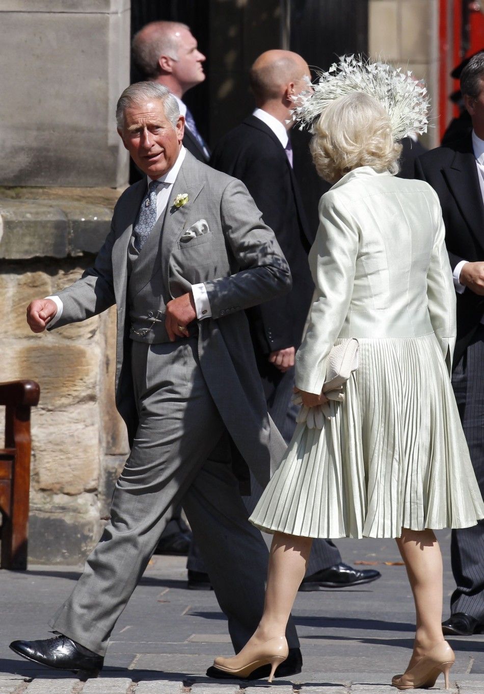 Britains Prince Charles and his wife Camilla, Duchess of Cornwall arrive for the wedding between Zara Phillips and Mike Tindall at Canongate Kirk in Edinburgh