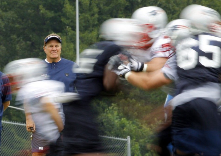 New England Patriots head coach Bill Belichick watches a drill during the afternoon practice session of their NFL training camp in Foxborough