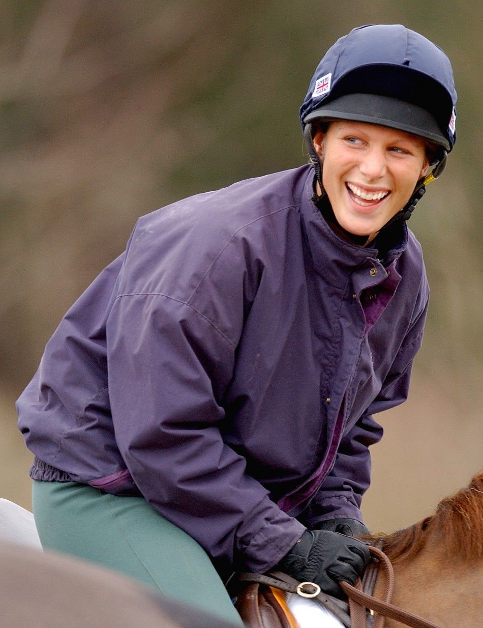 British Olympic hopeful Zara Phillips, the granddaughter of Britains Queen Elizabeth II, rides Ardfield Magic Star during a training session at Waresley Park Stud Farm, in southern England, February 11, 2004. Phillips is aiming to be selected to repres