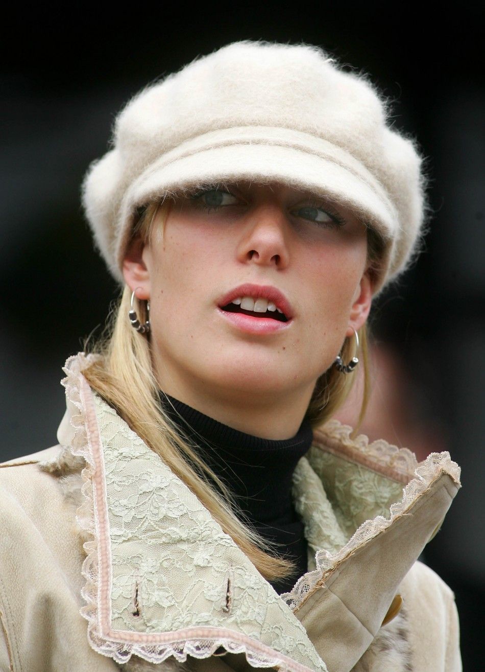 Britains Zara Phillips, granddaughter of Queen Elizabeth, arrives on the second day of the Cheltenham National Hunt Festival meeting in Gloucestershire, central England