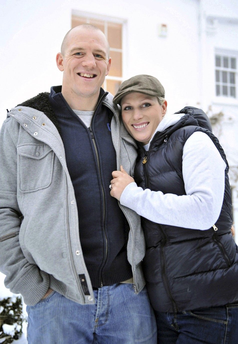 Zara Phillips and her fiance Mike Tindall pose for photographs at their home in Gloucestershire, south-west England 