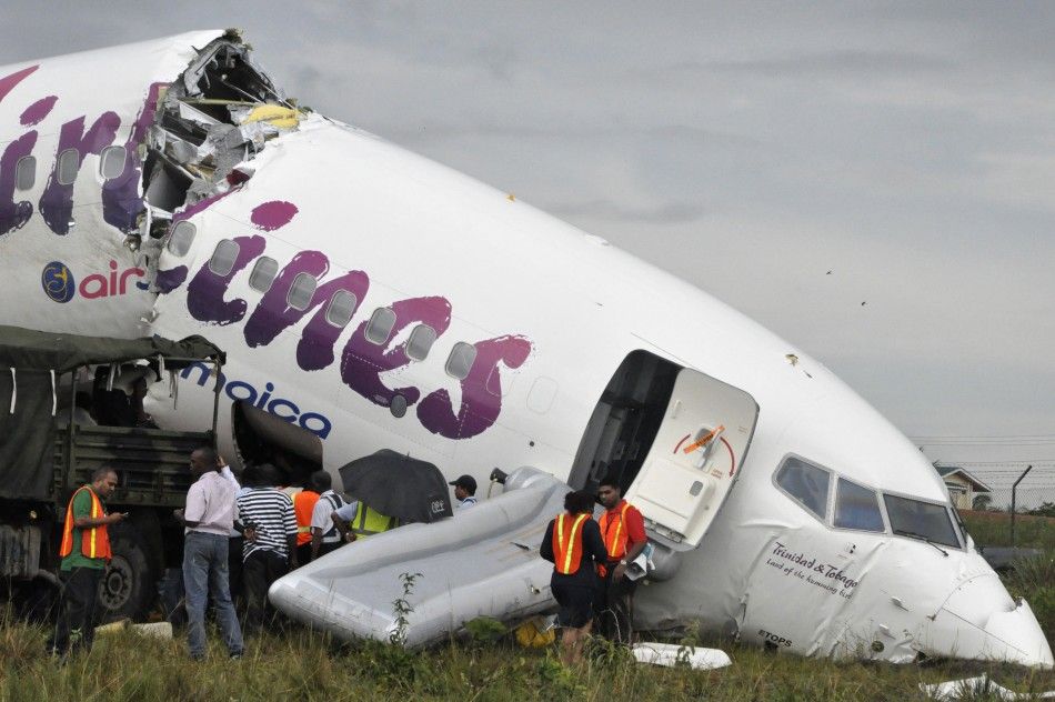 Caribbean Airlines jet is seen broken at Cheddi Jagan International airport outside Georgetown