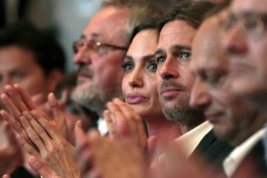 Angelina Jolie and Brad Pitt clap their hands on the final night of the 17th Sarajevo film festival