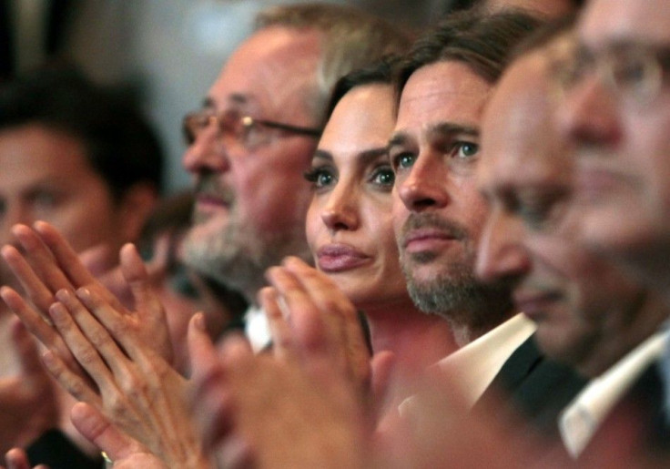 Angelina Jolie and Brad Pitt clap their hands on the final night of the 17th Sarajevo film festival