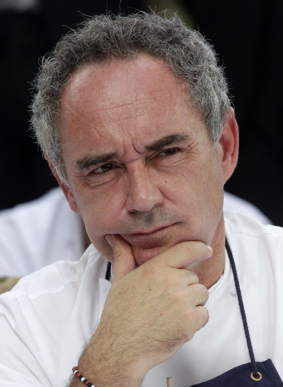Ferran Adria, chef and co-owner of El Bulli restaurant, gestures during a news conference outside the restaurant in Cala Montjoi, near Roses