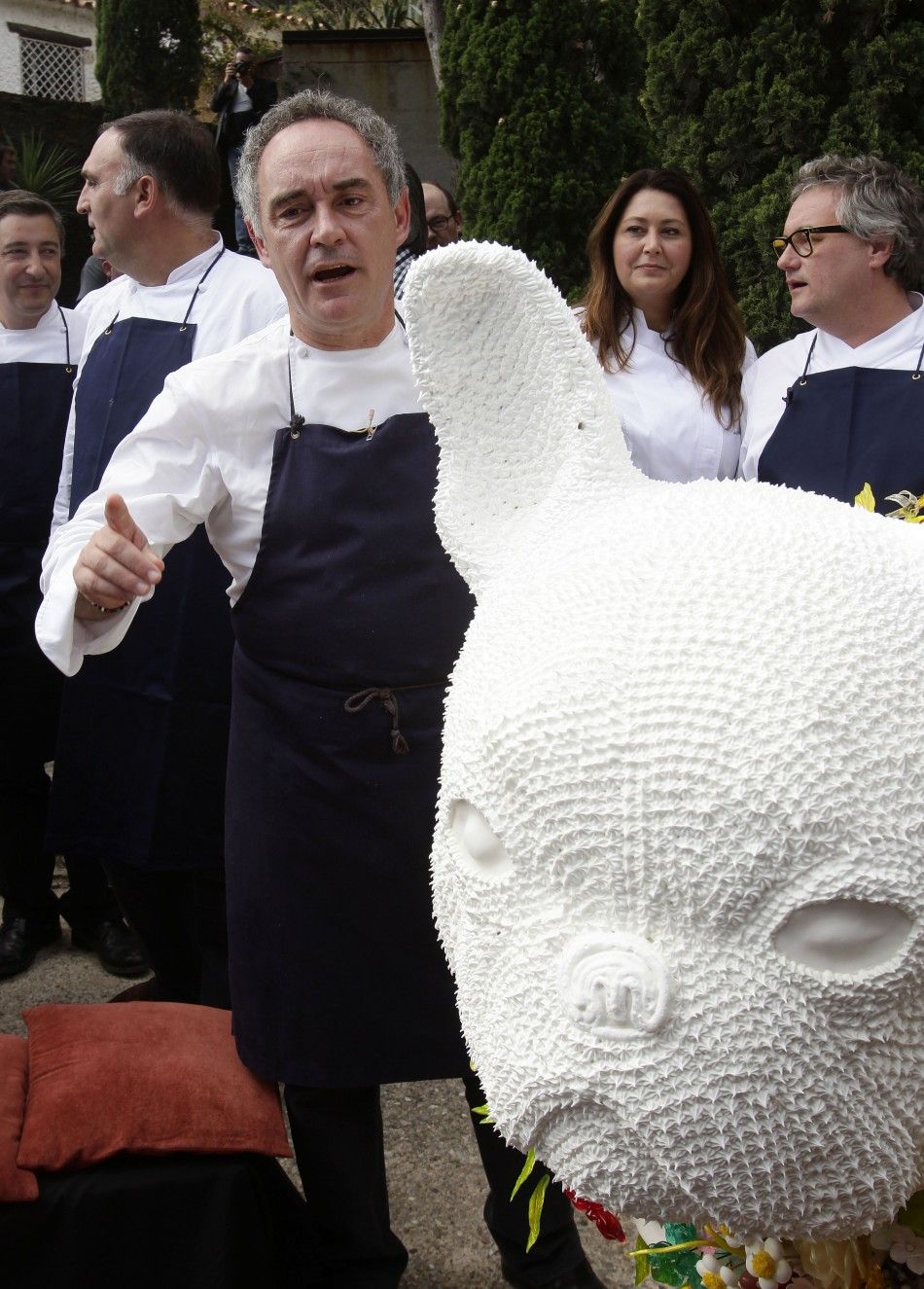 Ferran Adria, chef and co-owner of El Bulli restaurant, gestures during a news conference outside the restaurant in Cala Montjoi, near Roses.