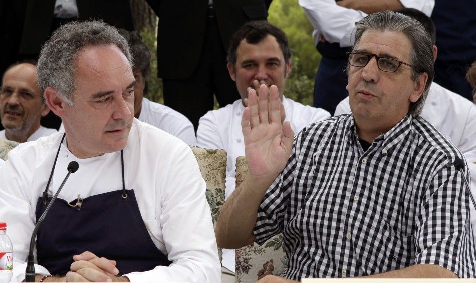 Ferran Adria L, chef and co-owner of El Bulli restaurant, sits next to co-owner Juli Soler during a news conference in Cala Montjoi, near Roses.