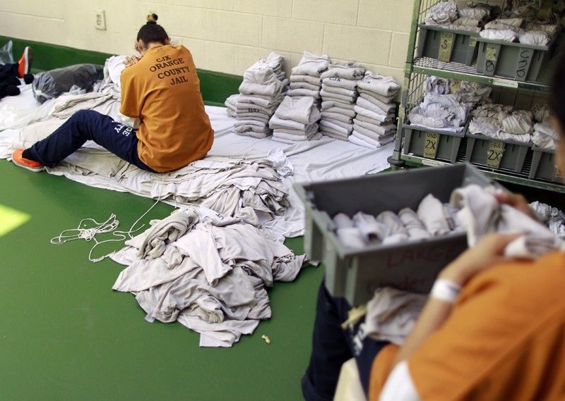 Inmates sort laundry at the Orange County jail in Santa Ana, California