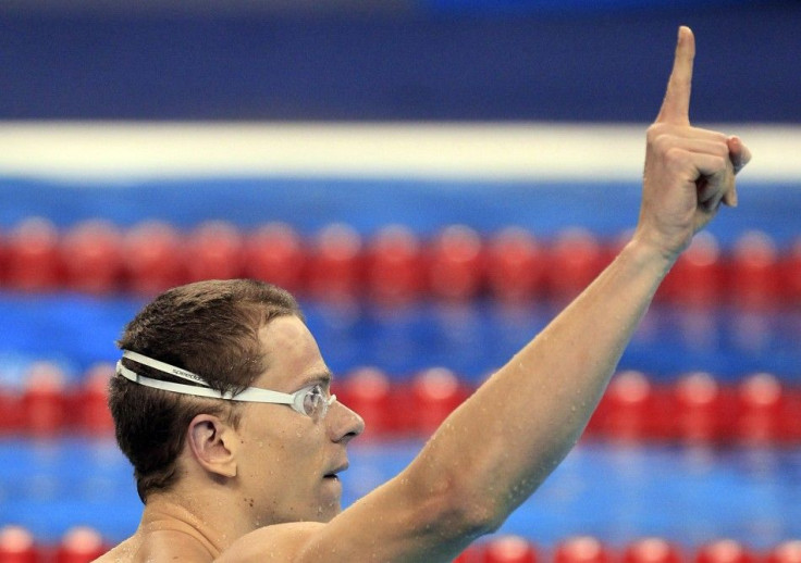 Brazil&#039;s Cielo Filho gestures after winning men&#039;s 50m freestyle final at 14th FINA World Championships in Shanghai