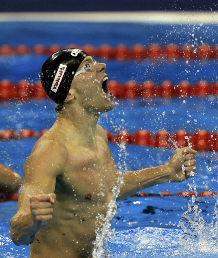 Brazil&#039;s Cielo Filho reacts after winning men&#039;s 50m butterfly final at the 14th FINA World Championships in Shanghai