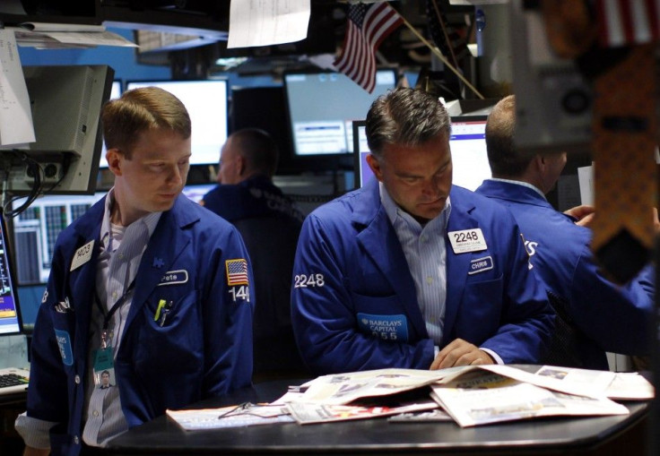 Traders work on the main trading floor of the New York Stock Exchange in New York
