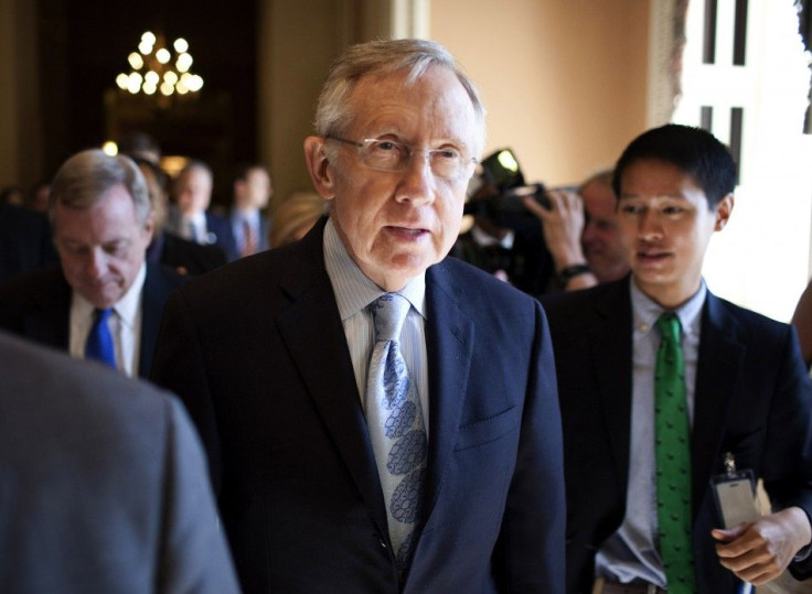 Harry Reid speaks with reporters after meeting with House Democratic leadership on the debt ceiling crises on Capitol Hill in Washington