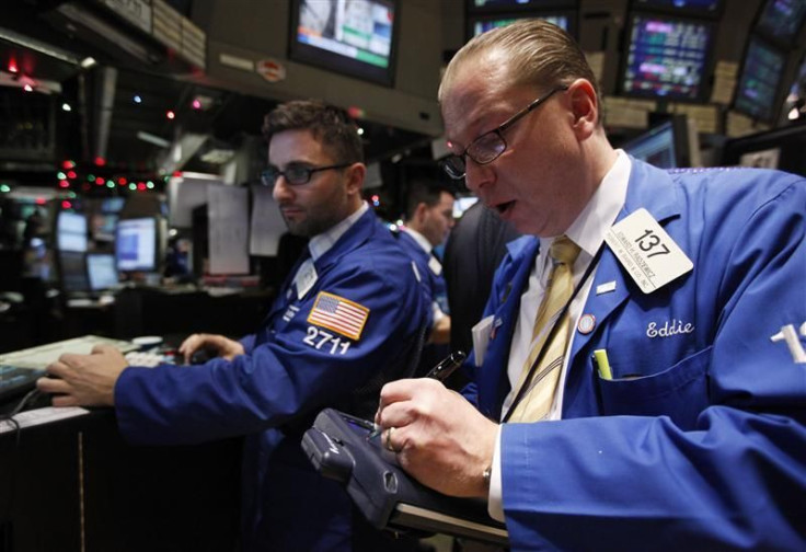 Traders work on the floor of the New York Stock Exchange