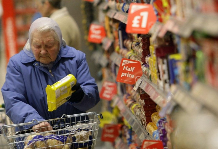 An elderly customer shops at a Morrisons store in Welling, Southeast London.