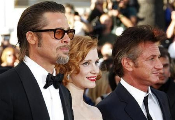 Cast members Brad Pitt (L), Jessica Chastain (C) and Sean Penn pose on the red carpet as they arrive for the screening of the film ''The Tree of Life'', by director Terrence Malick, in competition at the 64th Cannes Film Festival, May 